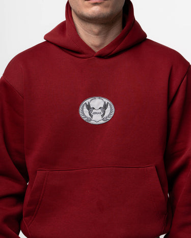 dettaglio-patch-con-logo-ricamata-felpa-bordeaux-oversizejonas-clothing